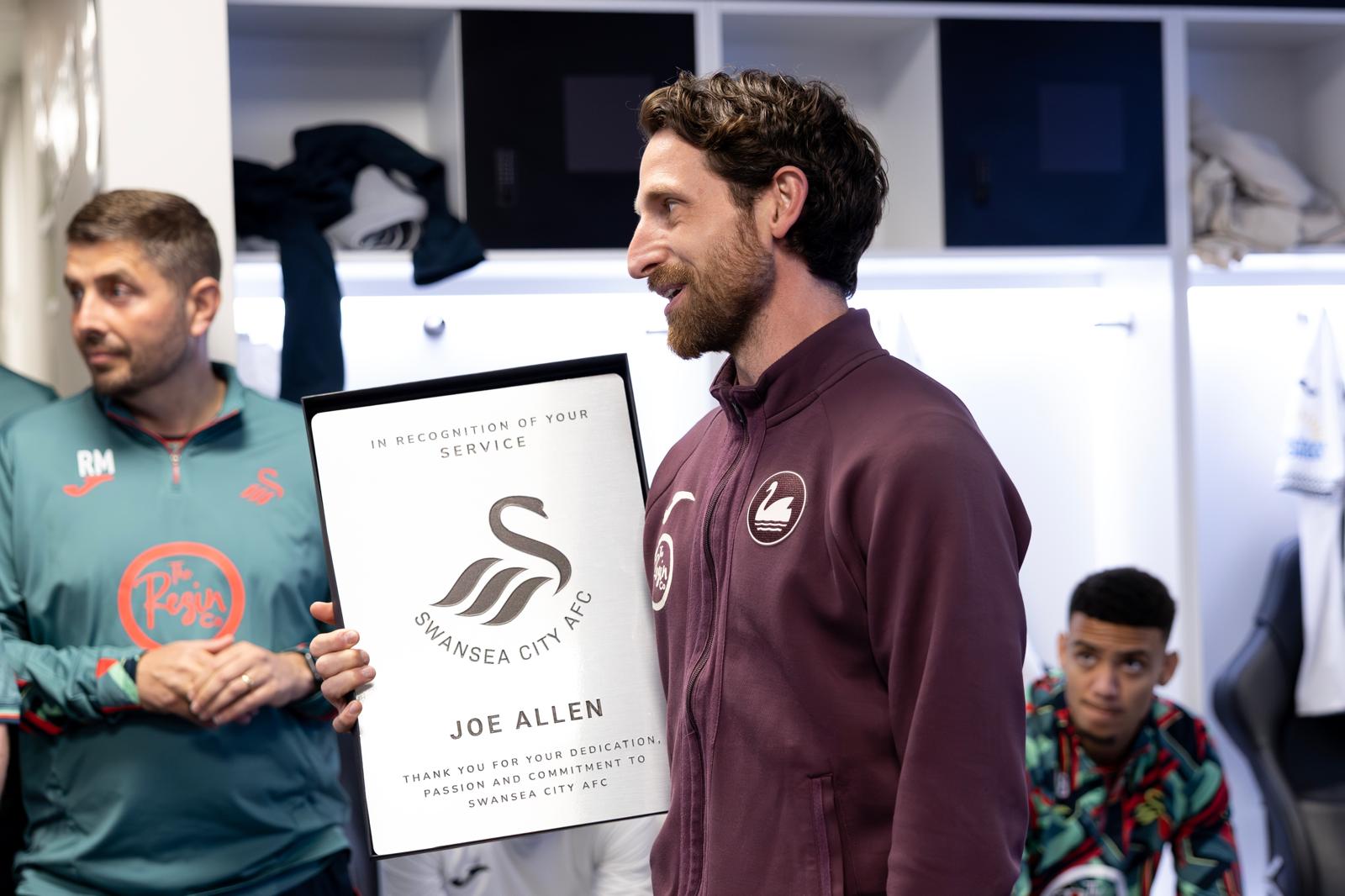 A service recognition plaque presented to Joe Allen in the Swansea City AFC dressing room
