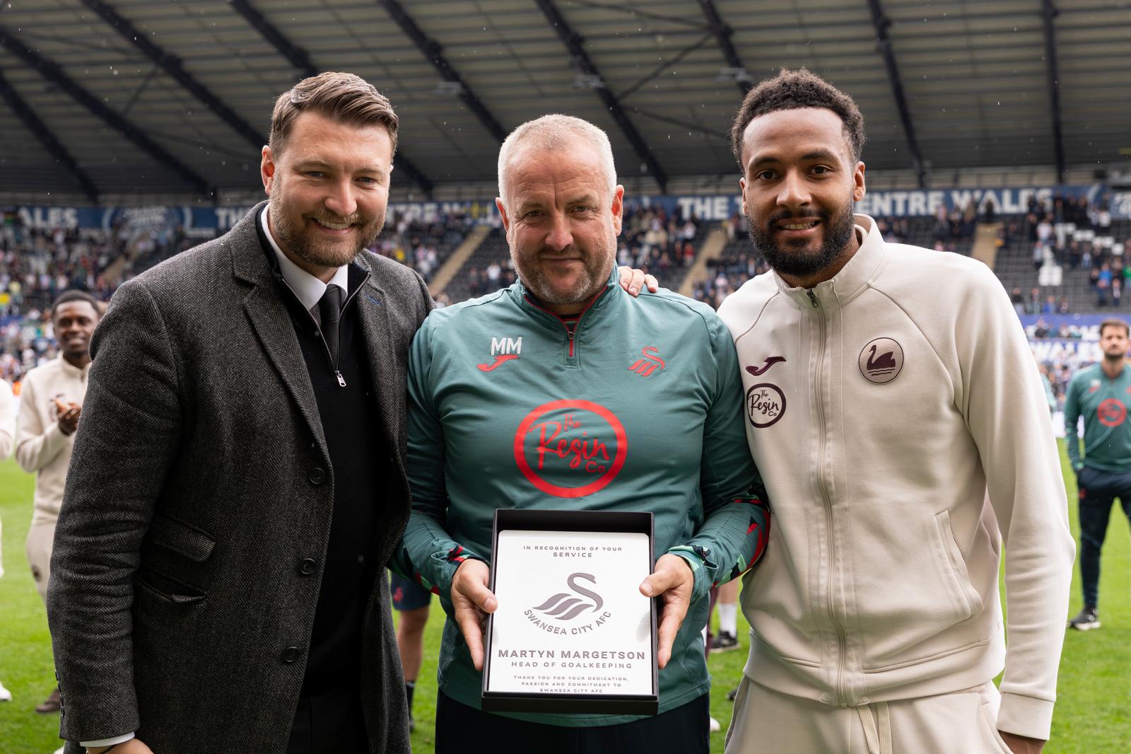 A service recognition plaque presented to Martyn Margetson, Head of Goalkeeping, pitchside at the Swansea.com Stadium